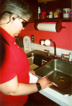 Blind user watching her sink